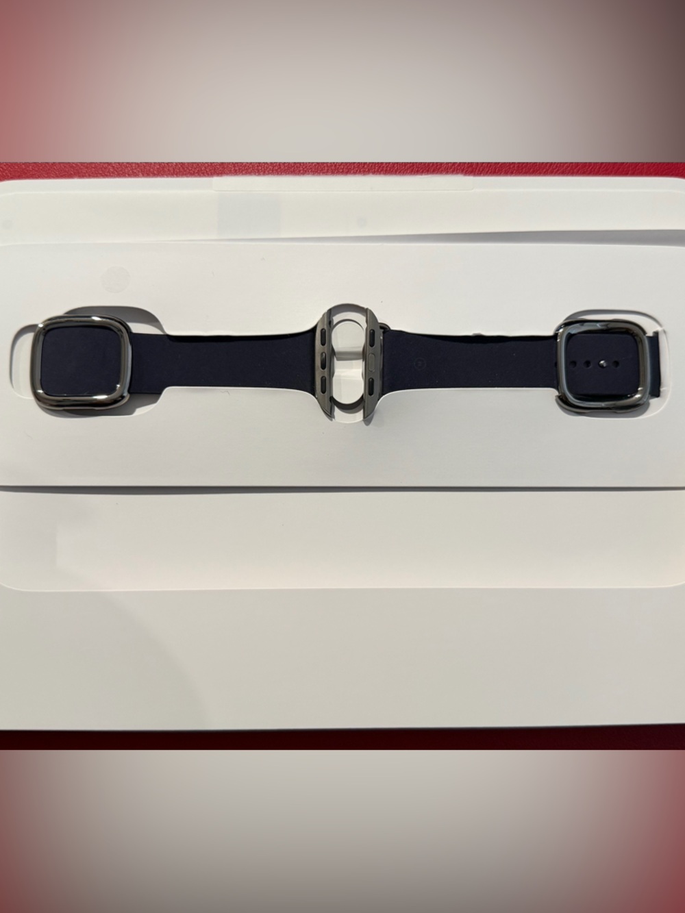 Apple Watch with Dark Blue Sport Band and Silver Case